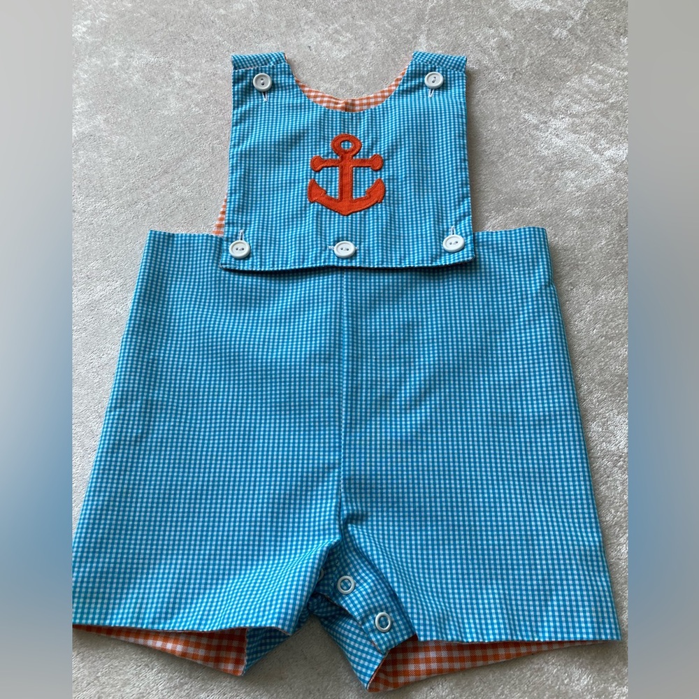 Reversible jumpsuit, checkered blue/white/orange and orange/white/blue